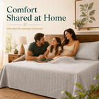 A family of three relaxing on a light grey Jacquard grounding sheet in a warm modern bedroom.